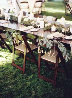 wedding chair sign ideas for the bride and grooms chairs 