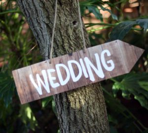 Wood Effect Wedding Directional Arrow Sign available from @theweddingomd