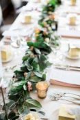 foliage-garland-running-along-table-with-gold-tea-light-hlders-to-add-a-touch-of-glamour-200x300