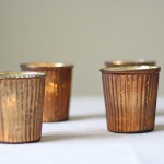 Bronze tea light holders available from @theweddingomd