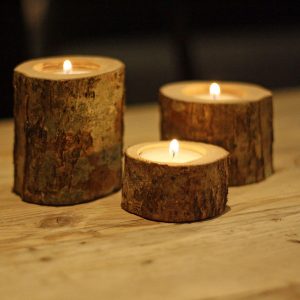 Rustic tea light holders made from branches of trees available from @theweddingomd