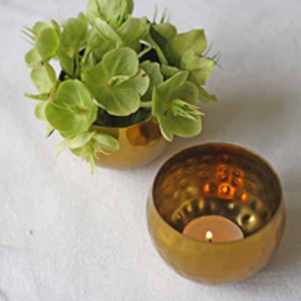Hammered gold tea light holders or small vases available from @theweddingomd The Wedding of my Dreams