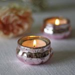 Pink tea light holders available from @theweddingomd The Wedding of my Dreams