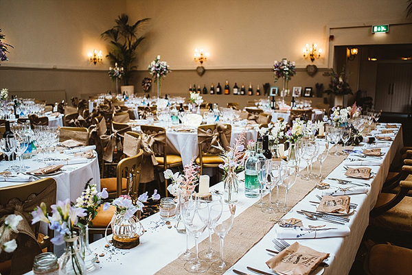 Top table for rustic wedding using hessian table runners from @theweddingomd