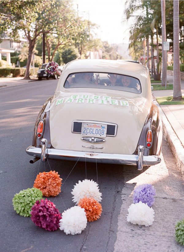 pom poms wedding getaway car decorations