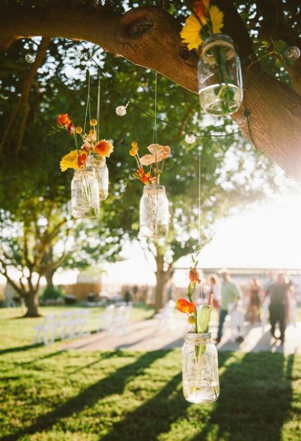 beautiful idea - hanging vases from tress - hanging vases available from @theweddingomd image from stylemepretty.com - custockphotography.com