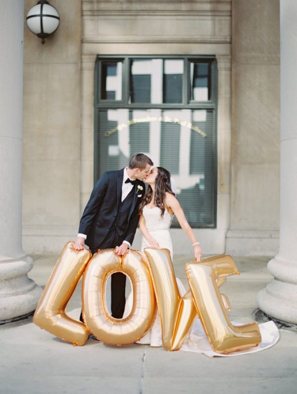 gold wedding decorations love balloons stylemepretty.com - brittamariephotography.com