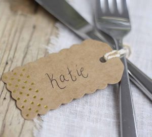 Brown kraft luggage tags with gold polka dots available from @theweddingomd