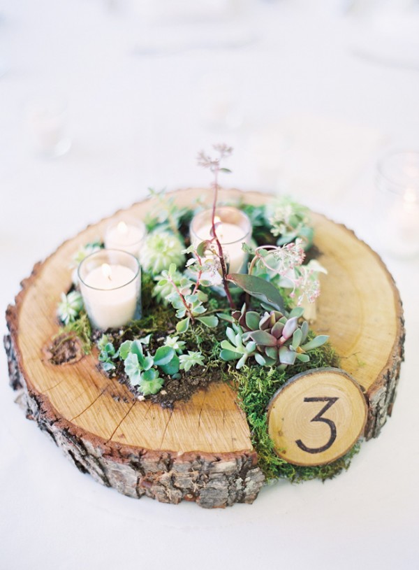 moss wedding centrepieces rustic tree slice