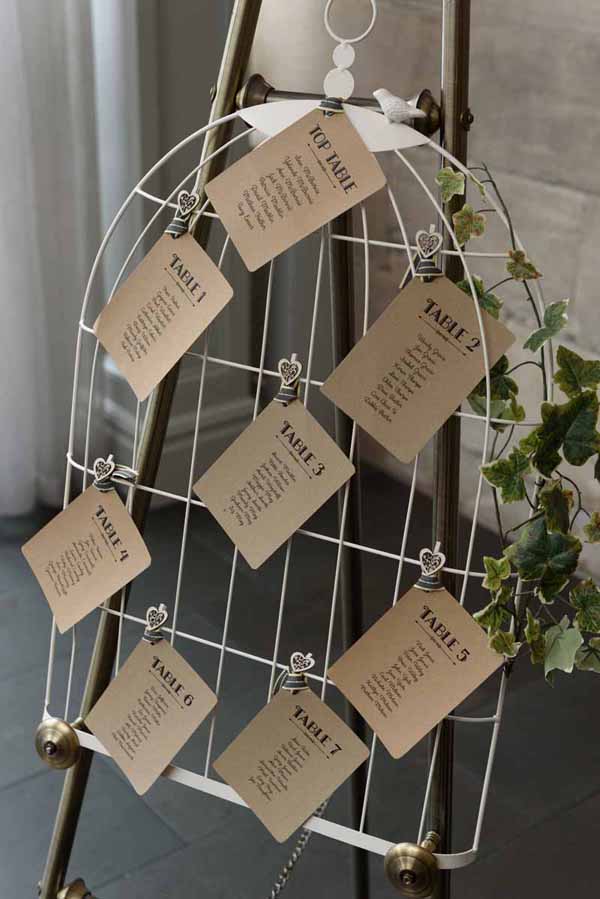 Pink Confetti Petals, Silver Candles & Love Is Sweet Favours Birdcage wedding table plan