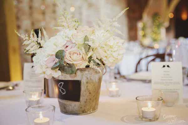  blackboard bucket centrepieces View More: http://gemmawilliamsphotography.pass.us/charlottebrad2016