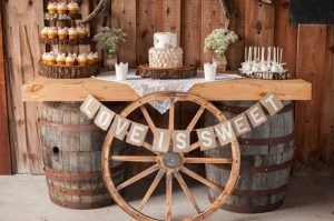 rustic cart wheel wedding ideas dessert table wedding