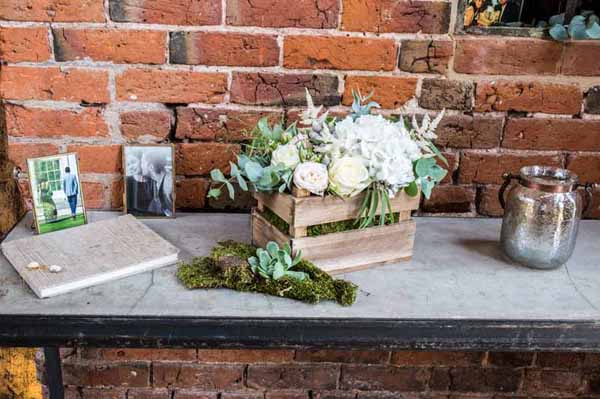 Real Weddings Using Our Small Wooden Crates Rustic small wooden crates of flowers guest book table at Shustoke Farm Barns - Lee Pallant Photography