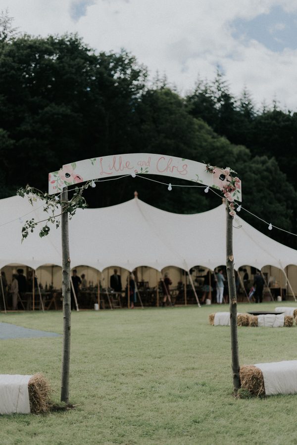 signs arches to enter marquee