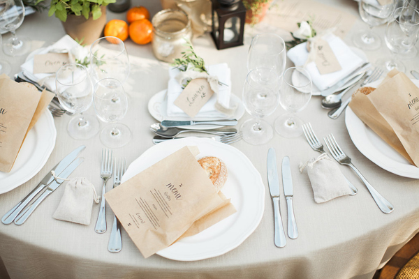 brown paper bag menus with fresh bread - rustic elegant alfresco wedding