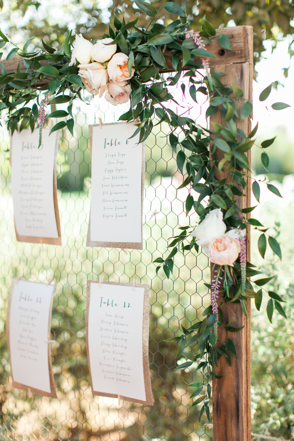 wedding table plan chicken wire frame floral garland