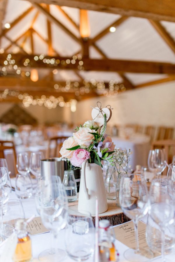 Cream Jug Centrepiece Inspiration & Ideas whimsicalwonderlandweddngs.com - lisacarpenterphotos.com