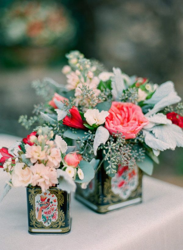 use bouquets in tins as extra table decorations wedding