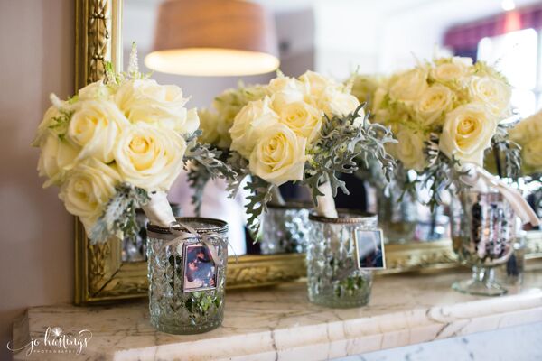 wedding bouquets in glass vases