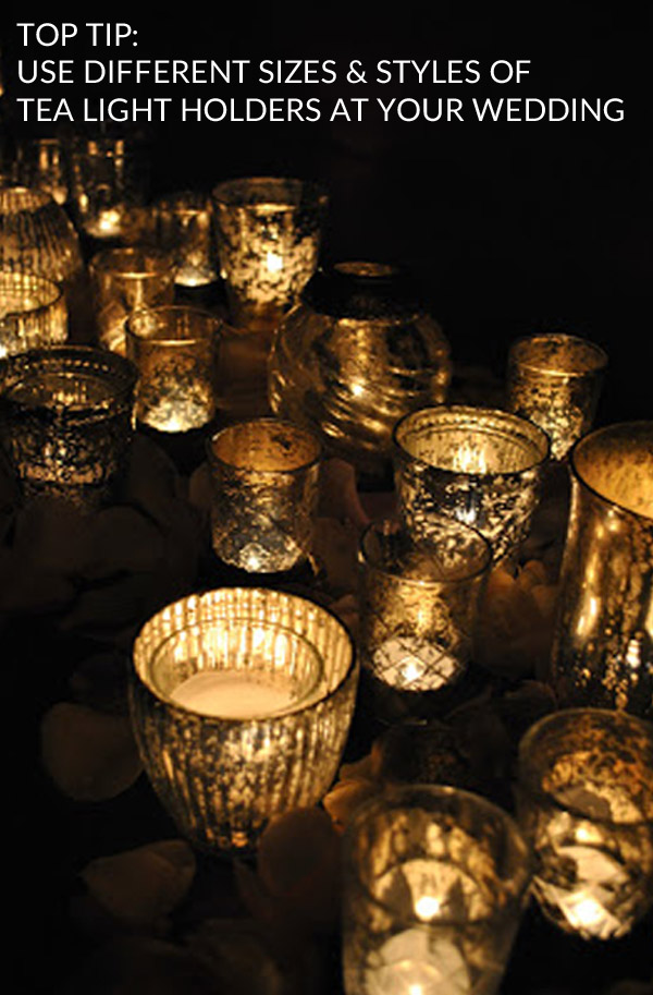 use different sizes and styles of tea light holders weddings