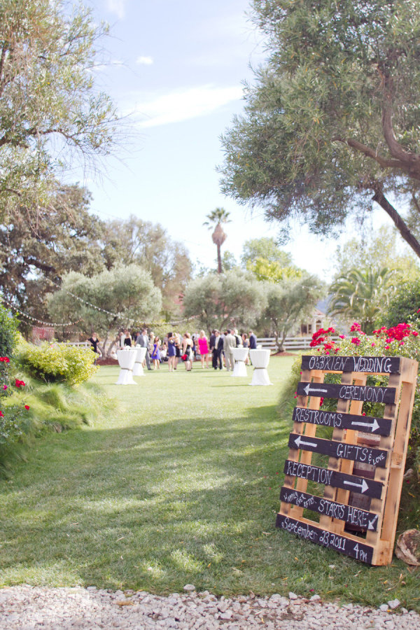 wooden pallets wedding order of the day signs