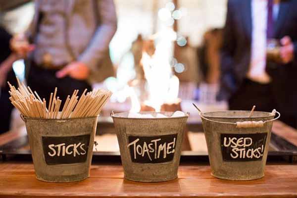 toasting marshmallows in buckets