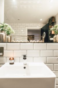 Industrial Living loft apartment sink subway tiles