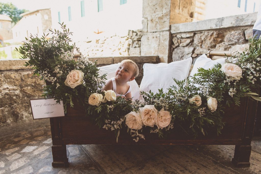 Flower girls wedding ideas cot with flower garland Passion for Flowers Bagno Vignoni Tuscany