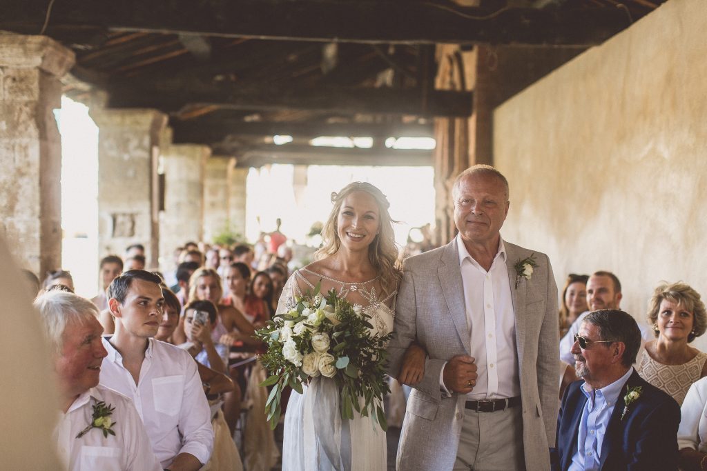 Outdoor wedding ceremony destination wedding Bagno VIgnoni Tuscany