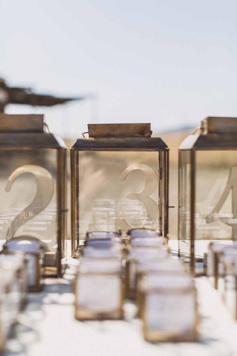 wedding escort cards brass lanterns 3