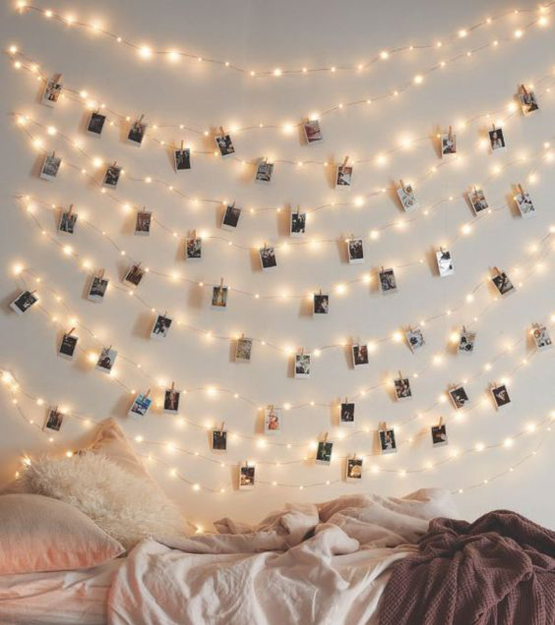 Wedding photo displays LED lights pegs and polaroid cameras