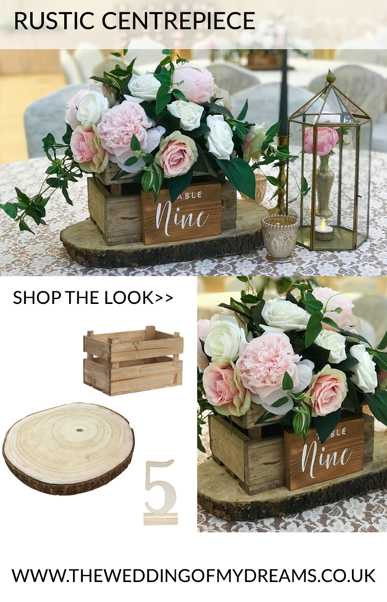 rustic wedding centrepieces wooden box of flowers tree stumps