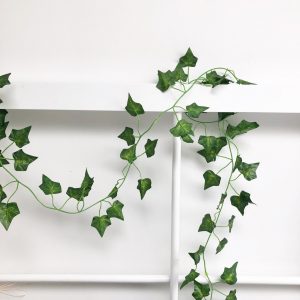 Decorative ivy garland decorate barn beams wedding venues