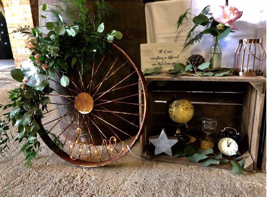 Wedding entrance display ideas rustic barn wedding styling wagon wheel cart wheels