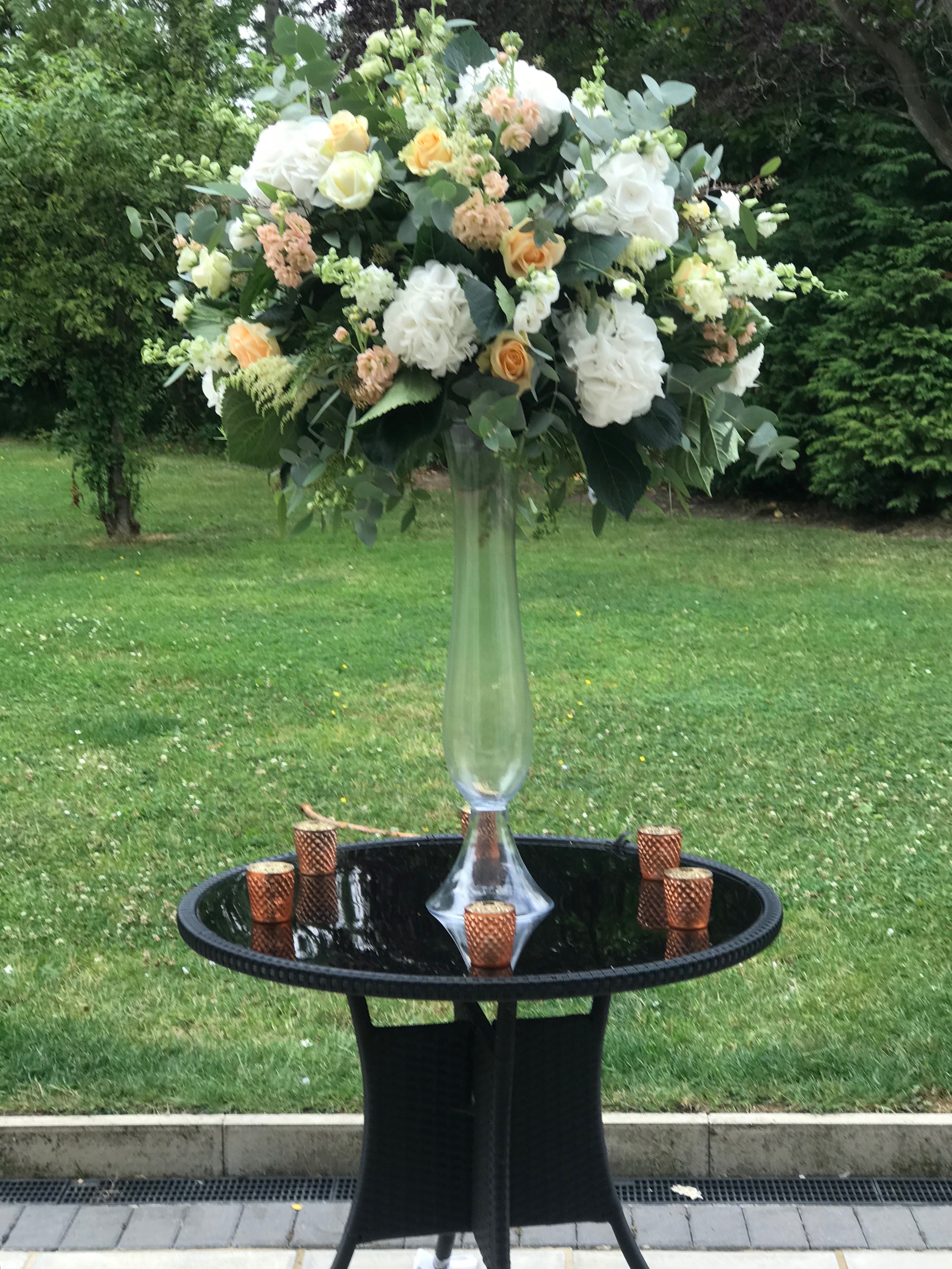 copper tea light holders tall glass vases wedding centrepieces