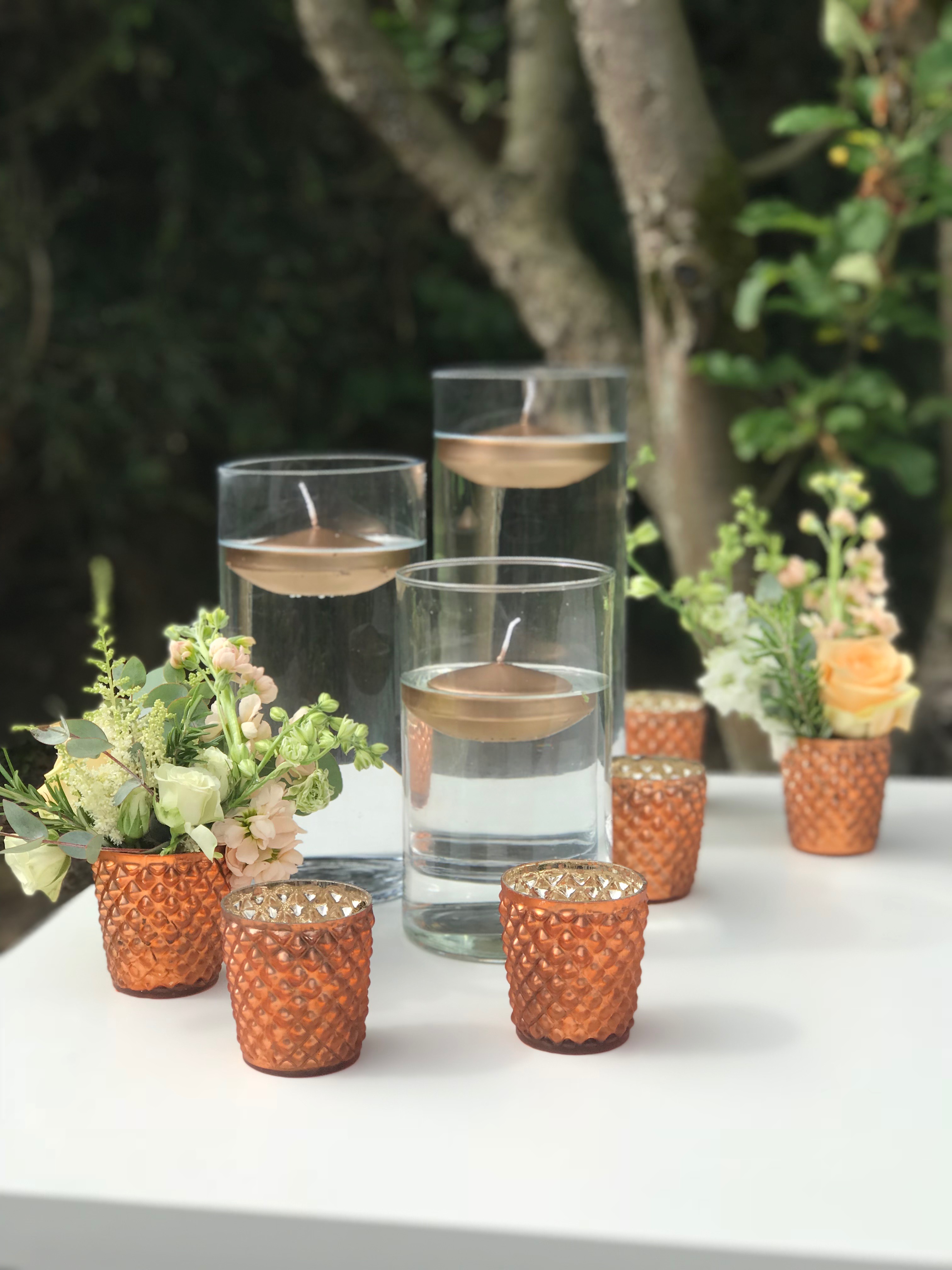 copper wedding centrepieces cylinder vases floating candles