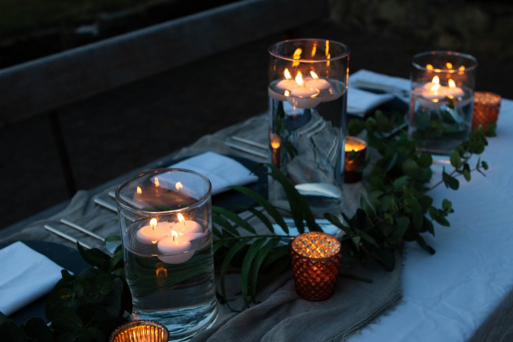 grey and copper wedding styling centrepieces copper tea lights grey table runners autumn wedding ideas