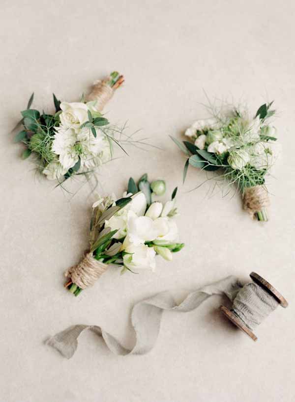 barn wedding button holes tied with twine of luxe grey silk ribbon