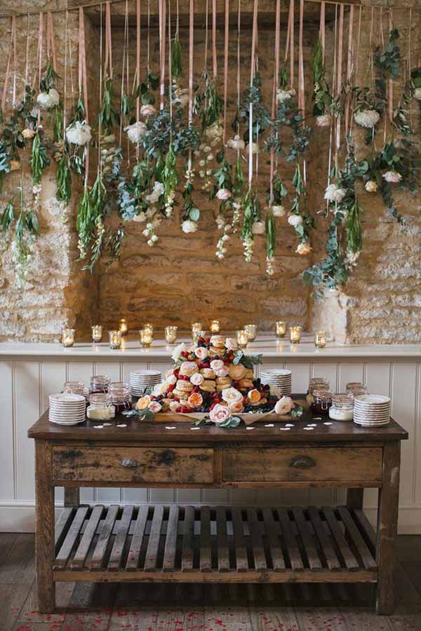 barn wedding hanging flowers installation