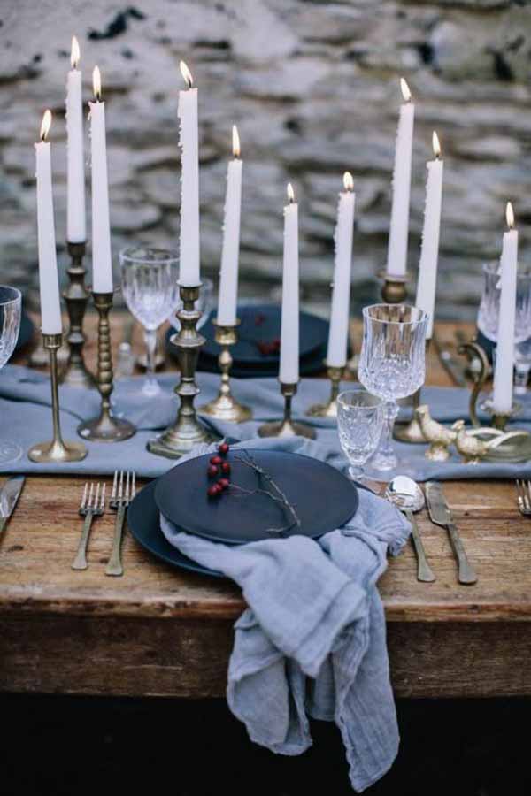 barn wedding with gold candlesticks and grey table runners