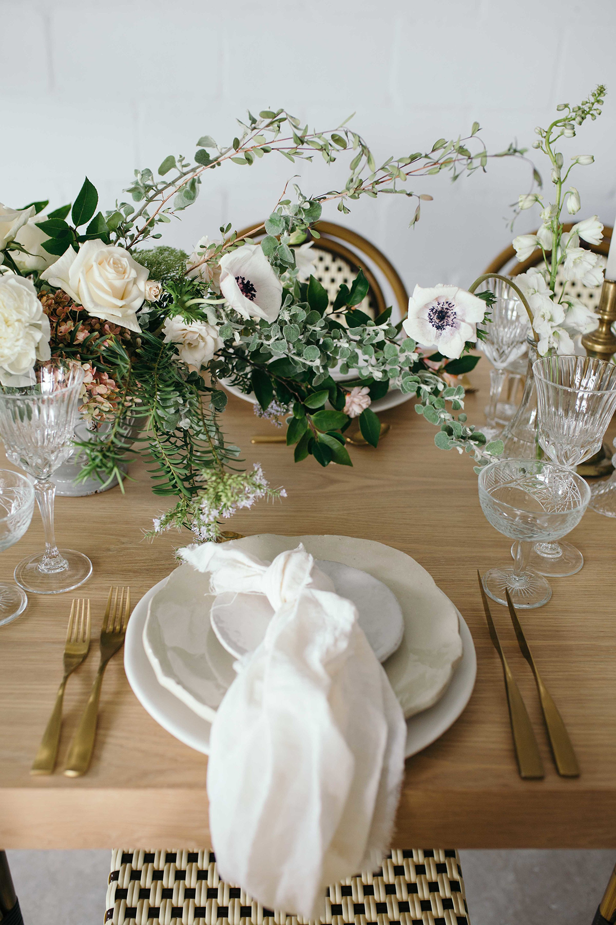 soft romantic wedding place settings napkin knotted on plate