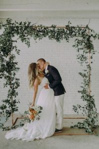 copper wedding backdrops with foliage
