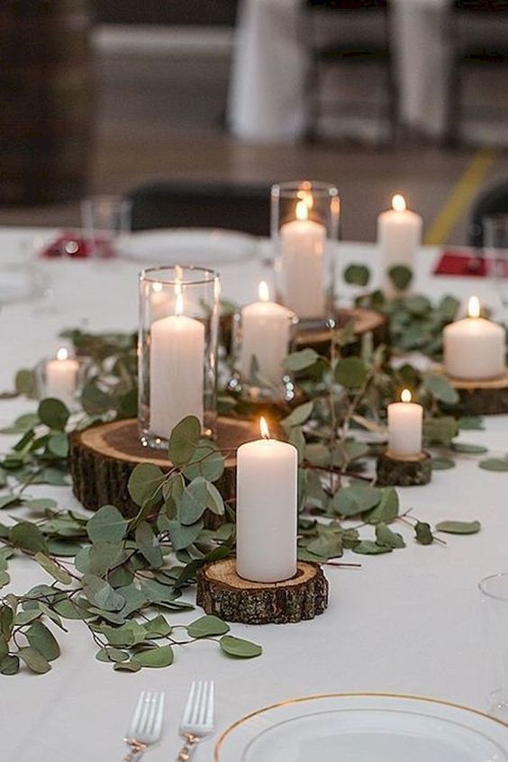 eucalyptus garlands wedding tables rustic wedding log slices
