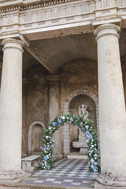 wedding arch natural blue flowers