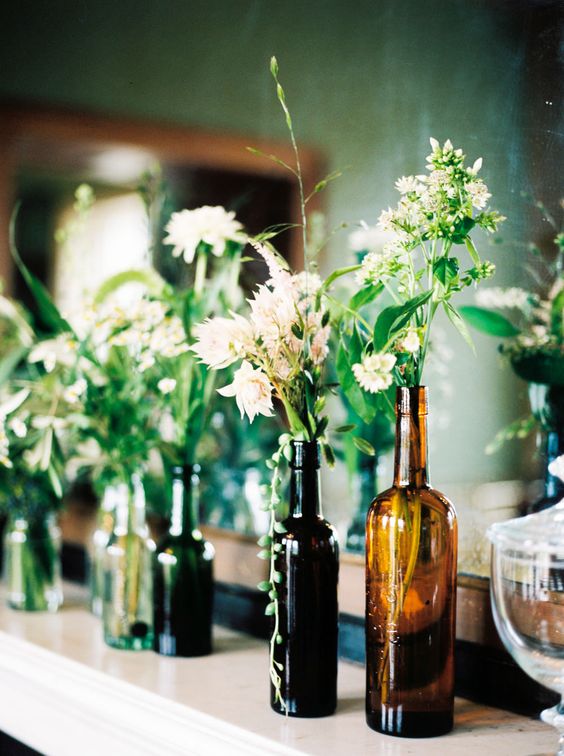 brown amber bottles wedding centrepieces