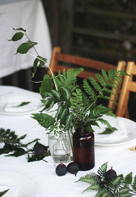 brown amber bottles wedding centrepieces