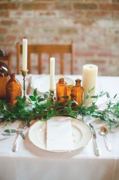 brown amber bottles wedding centrepieces