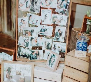 wedding photos displayed on wire mesh boards