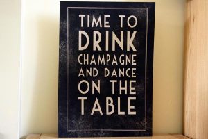 time to drink champagne and dance on the table wedding sign