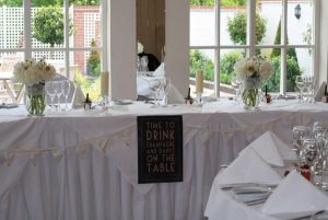 time to drink champagne and dance on the table wedding sign